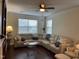 Bright living room featuring a comfortable sectional sofa and lots of natural light at 10411 Rosegate Court # 6, Raleigh, NC 27617