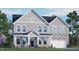Two-story home with gray siding, stone accents, a covered porch, and a two-car garage at 1121 Dartford Green Pl, Wake Forest, NC 27587