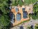 New construction homes are shown in an aerial view of a beautiful, established neighborhood at 1221 Dixie Trl, Raleigh, NC 27607