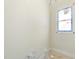 Bathroom featuring a window at 1221 Dixie Trl, Raleigh, NC 27607