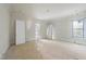 Bright bedroom with closet and window at 1221 Dixie Trl, Raleigh, NC 27607