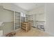 Walk-in closet with custom shelving and ample storage at 1221 Dixie Trl, Raleigh, NC 27607