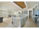 Spacious kitchen area with modern cabinet and island layouts, awaiting final installations for a modern gourmet experience at 1221 Dixie Trl, Raleigh, NC 27607