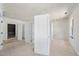 Open room with doors and fresh paint, construction phase with visible prep work at 1221 Dixie Trl, Raleigh, NC 27607