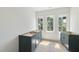 Bathroom features a vanity area with lots of natural light from the three windows at 1225 Dixie Trl, Raleigh, NC 27607