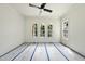 Bedroom features ample natural light, ceiling fan and large windows at 1225 Dixie Trl, Raleigh, NC 27607