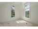 Bedroom featuring bright windows, light walls and natural light at 1229 Dixie Trl, Raleigh, NC 27607