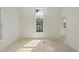 Bedroom featuring bright windows, light walls and natural light at 1229 Dixie Trl, Raleigh, NC 27607