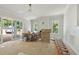 Bright living room with sliding glass doors, fireplace, and a view of the yard at 1229 Dixie Trl, Raleigh, NC 27607