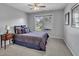 Comfortable bedroom with a window view and ample natural light at 12412 Mayhurst Pl, Raleigh, NC 27614