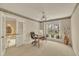 Traditional office with a large window, comfortable seating, and bright natural light at 12412 Mayhurst Pl, Raleigh, NC 27614