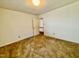 Bedroom featuring window, carpeted floor, and neutral walls at 1306 Oakridge Ave, Henderson, NC 27536