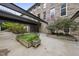 Exterior of building with an outdoor courtyard space at 1500 River Mill Dr # 310, Wake Forest, NC 27587