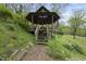 Ground view of gazebo with steps at 1500 River Mill Dr # 310, Wake Forest, NC 27587