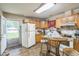 Kitchen with lots of natural light, appliances, and space for a dining table at 1726 Morgantown Rd, Burlington, NC 27217