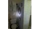 Small bathroom featuring a toilet, shower, and quirky decorations at 1806 Rendall St, Burlington, NC 27215
