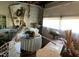 Garage interior featuring open storage, work table, and a rolling door, perfect for various projects at 1806 Rendall St, Burlington, NC 27215