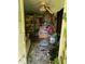 Living room needs TLC after damage, full of items and debris at 1806 Rendall St, Burlington, NC 27215