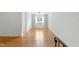 Bright room featuring hardwood floors, built-in shelves, and a window that allows for natural light at 1904 Smallwood Dr, Raleigh, NC 27605