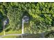 Overhead aerial view of the home on a lot full of mature trees at 2124 Country Air Ln, Hillsborough, NC 27278