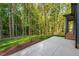Relaxing backyard featuring a patio and wooded views at 2124 Country Air Ln, Hillsborough, NC 27278