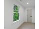 Bright bedroom with window and neutral carpet at 2124 Country Air Ln, Hillsborough, NC 27278