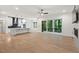Expansive living room with a fireplace and sliding glass doors leading to an outdoor space at 2124 Country Air Ln, Hillsborough, NC 27278
