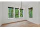 Bright room featuring large windows with natural light at 2124 Country Air Ln, Hillsborough, NC 27278