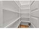 Walk-in pantry with ample shelving for optimal storage at 2124 Country Air Ln, Hillsborough, NC 27278