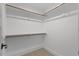 Spacious walk-in closet with ample shelving provides an organized storage solution at 2124 Country Air Ln, Hillsborough, NC 27278