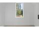 Bright room featuring a window with a lovely view of trees and natural light at 2124 Country Air Ln, Hillsborough, NC 27278