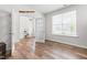 Office with wood flooring and a window features French doors leading to a bright living space at 222 Oak Branch - Lot 72 Trl, Garner, NC 27529