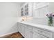 Pantry space with white cabinets and counter offering ample storage and natural light at 222 Oak Branch - Lot 72 Trl, Garner, NC 27529