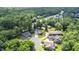 Beautiful aerial shot of a neighborhood highlighting the lush greenery and traditional-style homes at 2333 Grey Gables Dr, Burlington, NC 27215