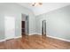 A spacious bedroom with vaulted ceiling, light green walls, and an ensuite bathroom and closet at 2333 Grey Gables Dr, Burlington, NC 27215