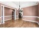 Dining room with chandelier and views into kitchen at 2333 Grey Gables Dr, Burlington, NC 27215