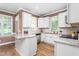 Bright kitchen with white cabinetry, granite countertops, and stainless appliances at 2333 Grey Gables Dr, Burlington, NC 27215