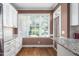 Bright eat-in kitchen area features ample windows and granite countertops at 2333 Grey Gables Dr, Burlington, NC 27215