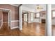 Spacious living room with hardwood floors, fireplace, and plenty of natural light at 2333 Grey Gables Dr, Burlington, NC 27215