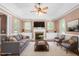 Tastefully furnished living room featuring a fireplace, comfortable seating, and bright light at 2333 Grey Gables Dr, Burlington, NC 27215