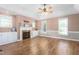 Bright living room features a fireplace flanked by custom shelving at 2333 Grey Gables Dr, Burlington, NC 27215
