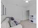Bonus room features light carpet, neutral colors, and ample seating at 236 Lucky Ribbon Ln, Holly Springs, NC 27540