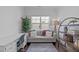 Cozy office space with a comfortable couch, desk, and ample natural light at 236 Lucky Ribbon Ln, Holly Springs, NC 27540