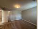 The carpeted bedroom offers great lighting and neutral walls at 238 Alamosa Pl, Cary, NC 27519