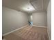 This room offers carpeting and a neutral color scheme at 238 Alamosa Pl, Cary, NC 27519