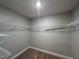 Walk-in closet features ample shelving, providing excellent storage options at 238 Alamosa Pl, Cary, NC 27519