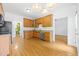Charming kitchen equipped with stainless steel appliances, granite countertops, and hardwood floors at 2418 Mont Haven Dr, Durham, NC 27712