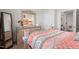 Comfortable bedroom featuring a large mirror and doorway, and a warm color palette at 2730 Spring Valley Dr, Creedmoor, NC 27522