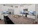 Modern kitchen with white cabinets, granite countertops, stainless appliances, and a large island at 2730 Spring Valley Dr, Creedmoor, NC 27522