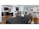 Open-concept dining area seamlessly connects to the living room and kitchen, promoting togetherness at 2801 E Shoreham St, Durham, NC 27707
